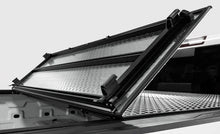 Load image into Gallery viewer, Access LOMAX Tri-Fold Cover Black Urethane Finish 22+ Toyota Tundra - 5ft 6in Bed - Additional View 6