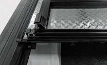Load image into Gallery viewer, Access LOMAX Tri-Fold Cover Black Urethane Finish 22+ Toyota Tundra - 5ft 6in Bed - Additional View 7
