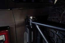 Load image into Gallery viewer, DV8 Offroad 21-23 Ford Bronco Spare Tire Guard & Accessory Mount - Installation View