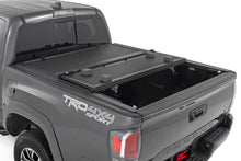 Load image into Gallery viewer, Rough Country Hard Low Profile Bed Cover | 5' Bed | Toyota Tacoma 2WD/4WD (2016-2023) 47420500B - Side View