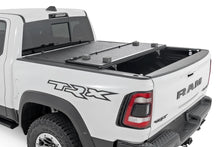 Load image into Gallery viewer, Rough Country Hard Low Profile Bed Cover | 5'7" Bed | No Rambox | Ram 1500 (19-25)/1500 TRX (21-24) 47320550B - Side View