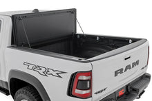Load image into Gallery viewer, Rough Country Hard Tri-Fold Flip Up Bed Cover | 6'4" | Ram 1500 (19-25)/1500 TRX (21-24) 49320650 - Side View