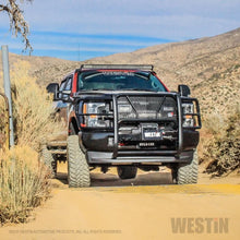Load image into Gallery viewer, Westin Ford F-250/350 17-19 HDX Winch Mount Grille Guard - Installation View