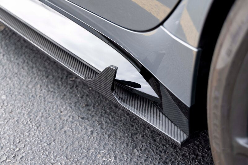 Dinan Carbon Fiber Side Skirts - Set fits BMW M3 / 2021-2026 BMW M3 / 2022-2026 BMW M3 Competition xDrive