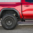 Load image into Gallery viewer, AFE 23-24 L4 GM Colorado/Canyon Rebel Series 3 IN 304 Stainless Steel Cat-Back System w/Black Tip - Installation View