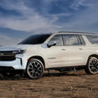 Load image into Gallery viewer, AMP Research 21-25 Chevrolet Suburban/Tahoe &amp; Cadillac Escalade PowerStep - Black - Side View