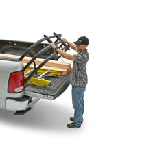 Load image into Gallery viewer, AMP Research 99-23 Ford F250/350 Superduty (Excl. SuperCrew) Bedxtender - Black - Installation View