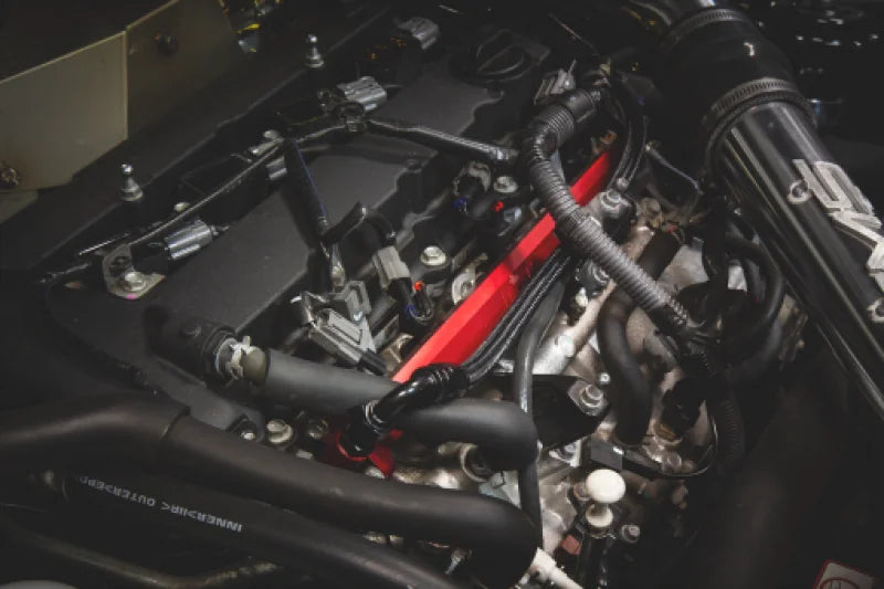 AMS Performance 08-15 Mitsubishi EVO X CNC Machined Aluminum Fuel Rail w/Pulsation Dampener - Red - Detail View