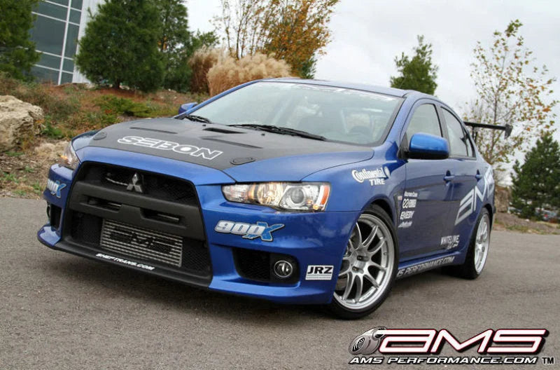 AMS Performance 08-15 Mitsubishi EVO X Front Mount Intercooler w/Modular Cast End Tanks & Logo - Main Product View