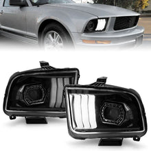 Load image into Gallery viewer, ANZO 05-09 Ford Mustang (w/Factory Halogen HL Only) Projector Headlights w/Light Bar Black Housing - Main Product View