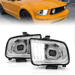 Load image into Gallery viewer, ANZO 05-09 Ford Mustang (w/Factory Halogen HL Only) Projector Headlights w/Light Bar Chrome Housing - Main Product View