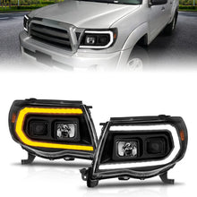 Load image into Gallery viewer, ANZO 05-11 Toyota Tacoma Projector Headlights w/Light Bar Switchback Black Housing - Main Product View