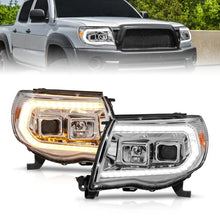 Load image into Gallery viewer, ANZO 05-11 Toyota Tacoma Projector Headlights w/Light Bar Switchback Chrome Housing - Main Product View