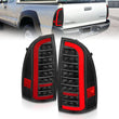 Load image into Gallery viewer, ANZO 05-15 Toyota Tacoma Full LED Tail Lights w/Light Bar Sequential Black Housing Clear Lens - Main Product View