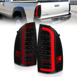 Load image into Gallery viewer, ANZO 05-15 Toyota Tacoma Full LED Tail Lights w/Light Bar Sequential Black Housing Smoke Lens - Main Product View