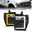 Load image into Gallery viewer, ANZO 08-10 Ford F-250 - F-550 Super Duty Projector Headlights w/ Light Bar Switchback Black Housing - Main Product View