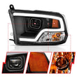 Load image into Gallery viewer, ANZO 09-18 Dodge Ram 1500 Plank Style Projector Headlights Black w/ Halo - Side View