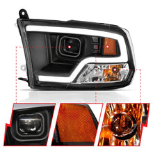 Load image into Gallery viewer, ANZO 09-18 Dodge Ram 1500 Plank Style Projector Headlights Black w/ Halo - Side View