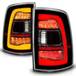 Load image into Gallery viewer, ANZO 09-18 Dodge Ram 1500 Sequential LED Taillights Black w/Switchback Amber Signal - Installation View