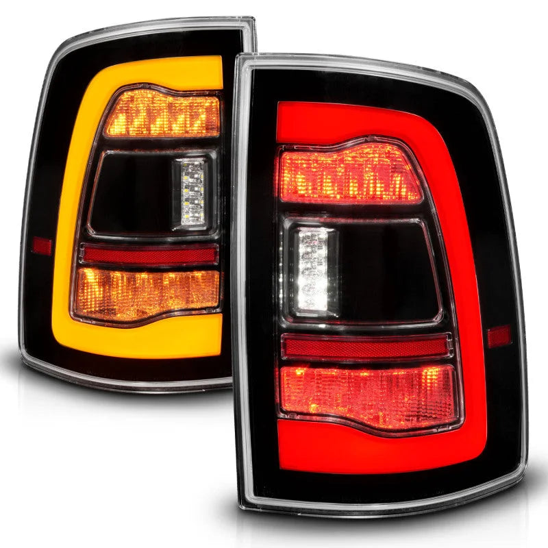 ANZO 09-18 Dodge Ram 1500 Sequential LED Taillights Black w/Switchback Amber Signal - Installation View