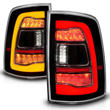 Load image into Gallery viewer, ANZO 09-18 Dodge Ram 1500 Sequential LED Taillights Black w/Switchback Amber Signal - Installation View