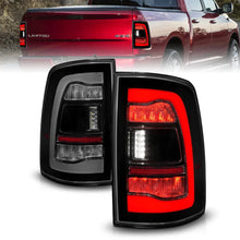 Load image into Gallery viewer, ANZO 09-18 Dodge Ram 1500 Sequential LED Taillights Smoke Black - Main Product View