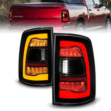 Load image into Gallery viewer, ANZO 09-18 Dodge Ram 1500 Sequential LED Taillights Smoke Black w/Switchback Amber Signal - Main Product View
