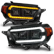 Load image into Gallery viewer, ANZO 10-13 Toyota 4Runner Projector Headlights - Black - Side View