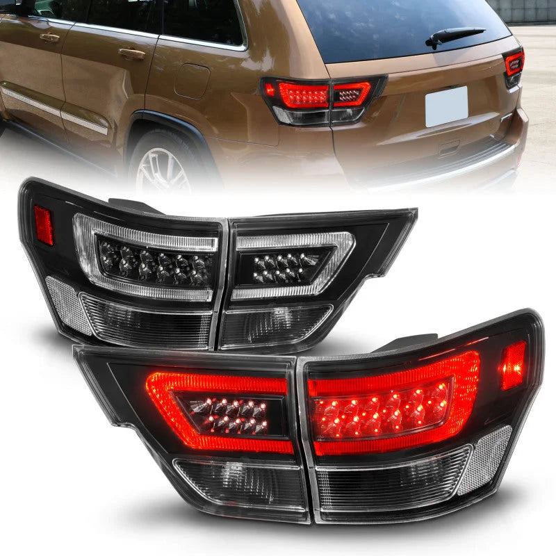 ANZO 11-13 Jeep Grand Cherokee LED Taillights w/ Lightbar Black Housing/Clear Lens 4pcs - Main Product View