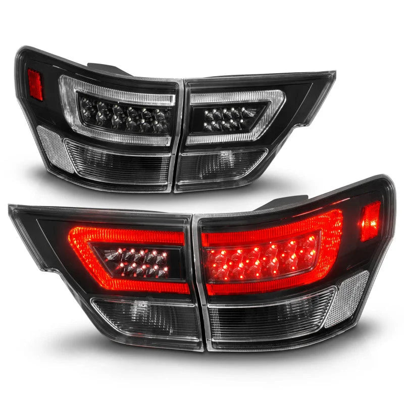 ANZO 11-13 Jeep Grand Cherokee LED Taillights w/ Lightbar Black Housing/Clear Lens 4pcs - Back View