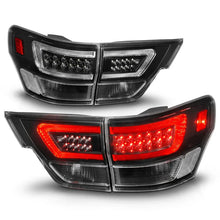 Load image into Gallery viewer, ANZO 11-13 Jeep Grand Cherokee LED Taillights w/ Lightbar Black Housing/Clear Lens 4pcs - Back View