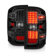 Load image into Gallery viewer, ANZO 15-19 Chevy Silverado 2500HD/3500HD (Factory Halogen Only) LED Tail Lights Black w/Clear Lens - Installation View