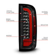 Load image into Gallery viewer, ANZO 15-21 GMC Canyon Full LED Taillights w/ Red Lightbar Black Housing/Clear Lens - Installation View