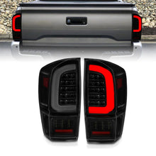 Load image into Gallery viewer, ANZO 16-21 Toyota Tacoma LED Tail Lights - w/ Light Bar Sequential Black Housing &amp; Smoke Lens - Main Product View