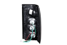 Load image into Gallery viewer, ANZO 1986-1993 Mazda B2000 Taillights Black - Side View