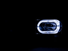 Load image into Gallery viewer, ANZO 1988-1998 Chevrolet C1500 Crystal Headlights Carbon w/ Halo - Side View