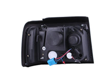 Load image into Gallery viewer, ANZO 1992-1996 Ford F-150 Projector Headlights w/ Halo Black w/ Side Markers and Parking Lights - Detail View