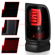 Load image into Gallery viewer, ANZO 1994-2001 Dodge Ram 1500 LED Taillights Plank Style Black w/Smoke Lens - Installation View
