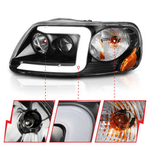 Load image into Gallery viewer, ANZO 1997-2003 Ford F-150 Projector Headlights w/ Light Bar Black Housing - Installation View