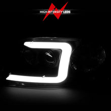 Load image into Gallery viewer, ANZO 1997-2003 Ford F-150 Projector Headlights w/ Light Bar Chrome Housing - Installation View