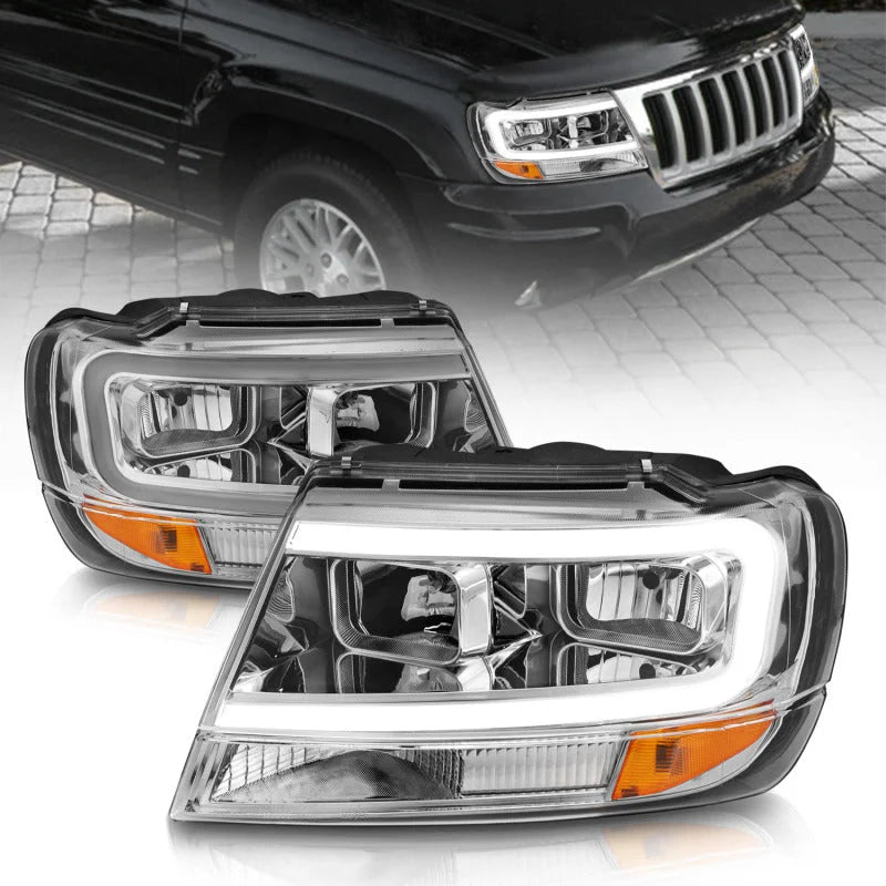 ANZO 1999-2004 Jeep Grand Cherokee Crystal Headlights w/ Light Bar Chrome Housing - Main Product View