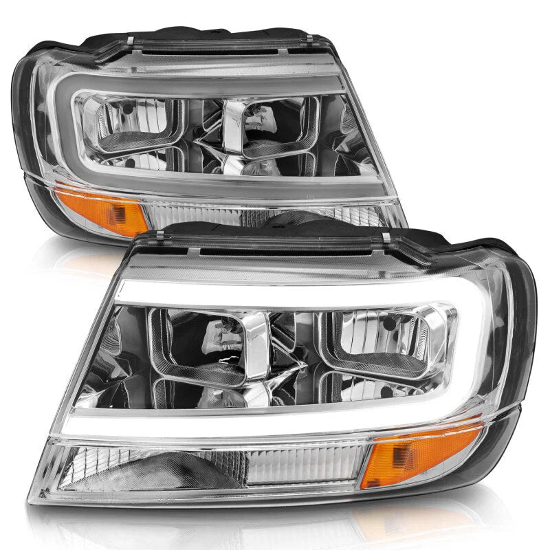 ANZO 1999-2004 Jeep Grand Cherokee Crystal Headlights w/ Light Bar Chrome Housing - Installation View