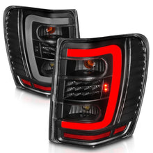 Load image into Gallery viewer, ANZO 1999-2004 Jeep Grand Cherokee LED Tail Lights w/ Light Bar Black Housing Clear Lens - Side View