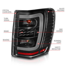 Load image into Gallery viewer, ANZO 1999-2004 Jeep Grand Cherokee LED Tail Lights w/ Light Bar Black Housing Clear Lens - Back View