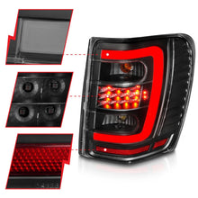 Load image into Gallery viewer, ANZO 1999-2004 Jeep Grand Cherokee LED Tail Lights w/ Light Bar Black Housing Clear Lens - Additional View 7