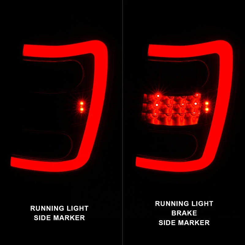 ANZO 1999-2004 Jeep Grand Cherokee LED Tail Lights w/ Light Bar Black Housing Smoke Lens - Side View