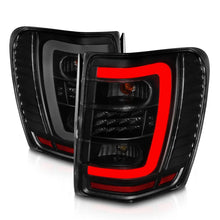 Load image into Gallery viewer, ANZO 1999-2004 Jeep Grand Cherokee LED Tail Lights w/ Light Bar Black Housing Smoke Lens - Additional View 6