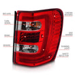 Load image into Gallery viewer, ANZO 1999-2004 Jeep Grand Cherokee LED Tail Lights w/ Light Bar Chrome Housing Red/Clear Lens - Installation View