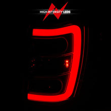 Load image into Gallery viewer, ANZO 1999-2004 Jeep Grand Cherokee LED Tail Lights w/ Light Bar Chrome Housing Red/Clear Lens - Additional View 7