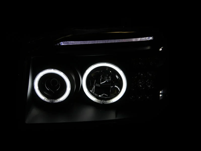 ANZO 2001-2004 Nissan Frontier Projector Headlights w/ Halo Black (CCFL) - Side View